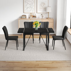 Black Faux Wood Grain MDF Dining Table Set.A minimalist retro rectangular dining table with a black textured top.Paired with 4 Black PU chairs with a vertical stripe design on the backrest.