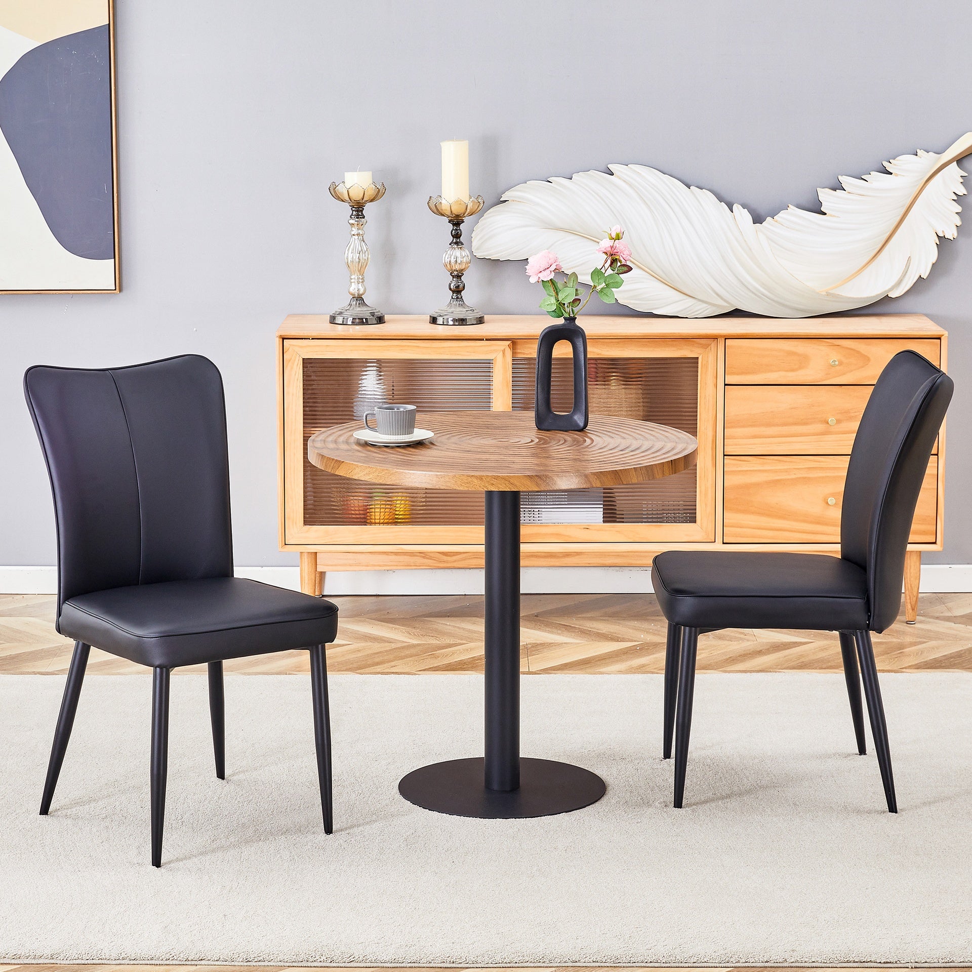 Table and chair set.31.5 Inch Dark Wood Grain Round Dining Table - Suction Molding Annular Texture.Paired with 2 Black PU chairs with a vertical stripe design on the backrest and black metal legs.