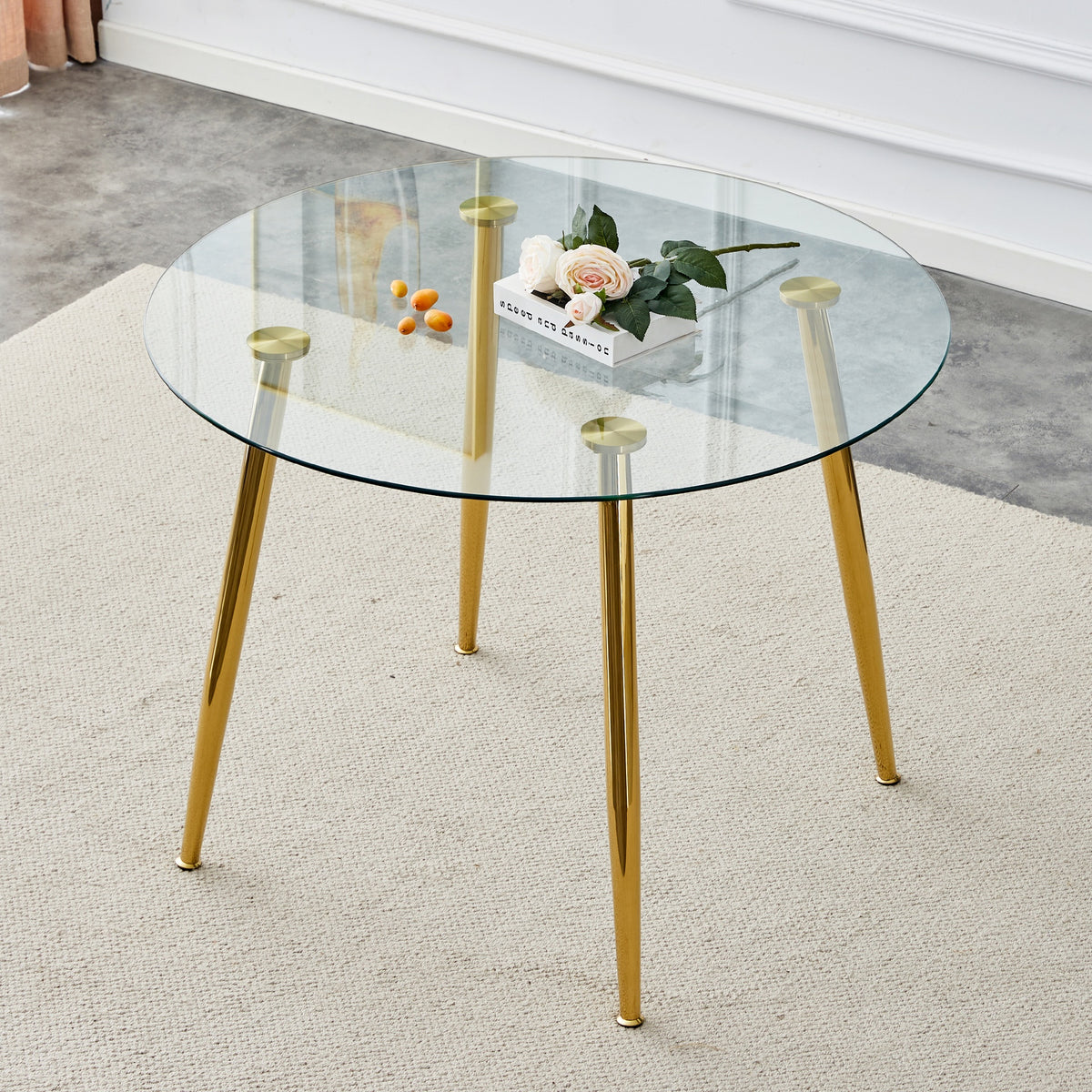 A glass tabletop with a diameter of 40 inches and a modern minimalist circular dining table with electroplated golden metal legs.Suitable for living rooms, and conference rooms.W1151S00375,W1151S02857