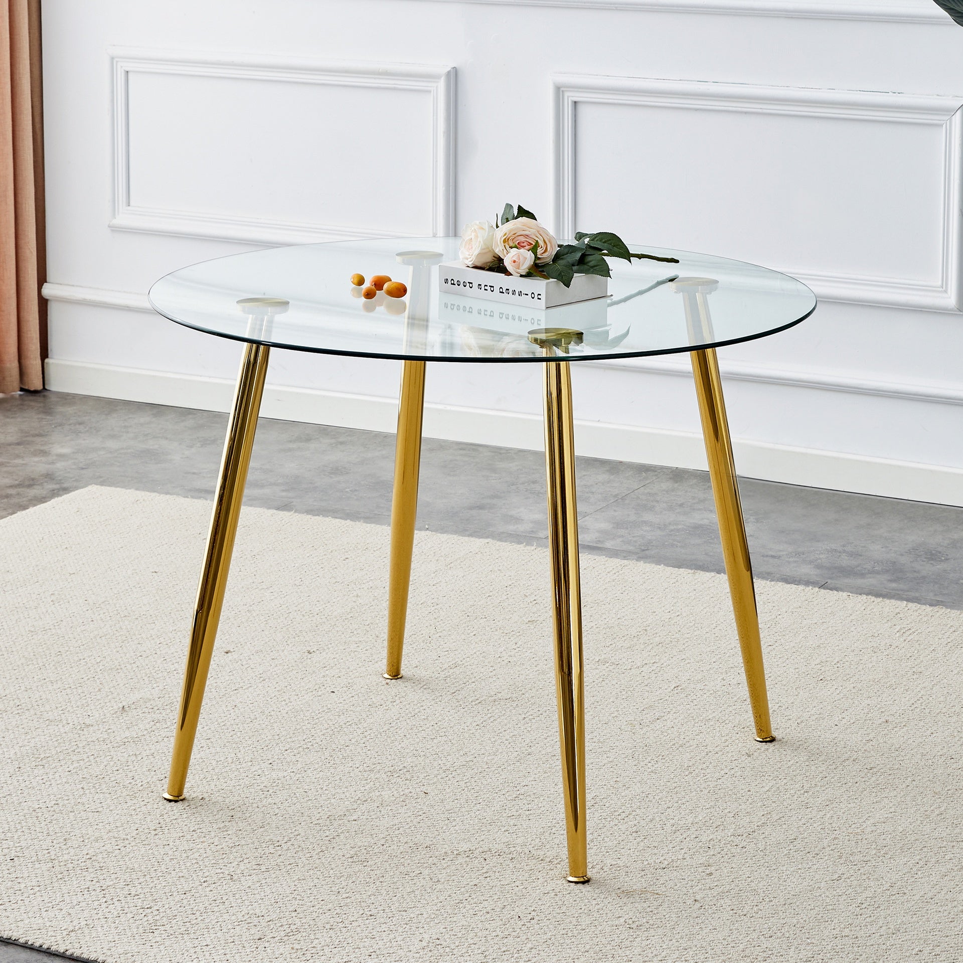 A glass tabletop with a diameter of 40 inches and a modern minimalist circular dining table with electroplated golden metal legs.Suitable for living rooms, and conference rooms.W1151S00375,W1151S02857