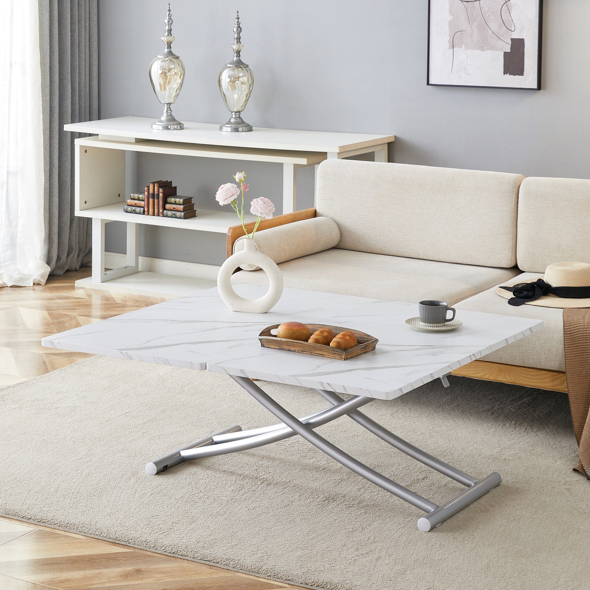 Modern minimalist multifunctional lift table with 0.8 inch thick MDF desktop and silver metal legs, can be used as a dressing table, coffee table, dining table, and office table.W1151126194