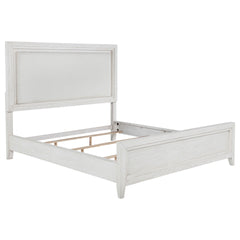Inverness Distressed White Eastern King Upholstered Panel Bed