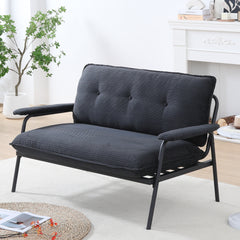 The 53-inch black sofa offers a spacious layout in the small apartment, easily handling various scenarios from watching movies to working