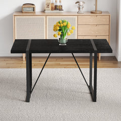 A 55-Inch minimalist retro rectangular dining table with a black textured top with Inset Rectangular Black Metal legs.Minimalist MDF Tabletop.Meeting various purposes such as dining and working.