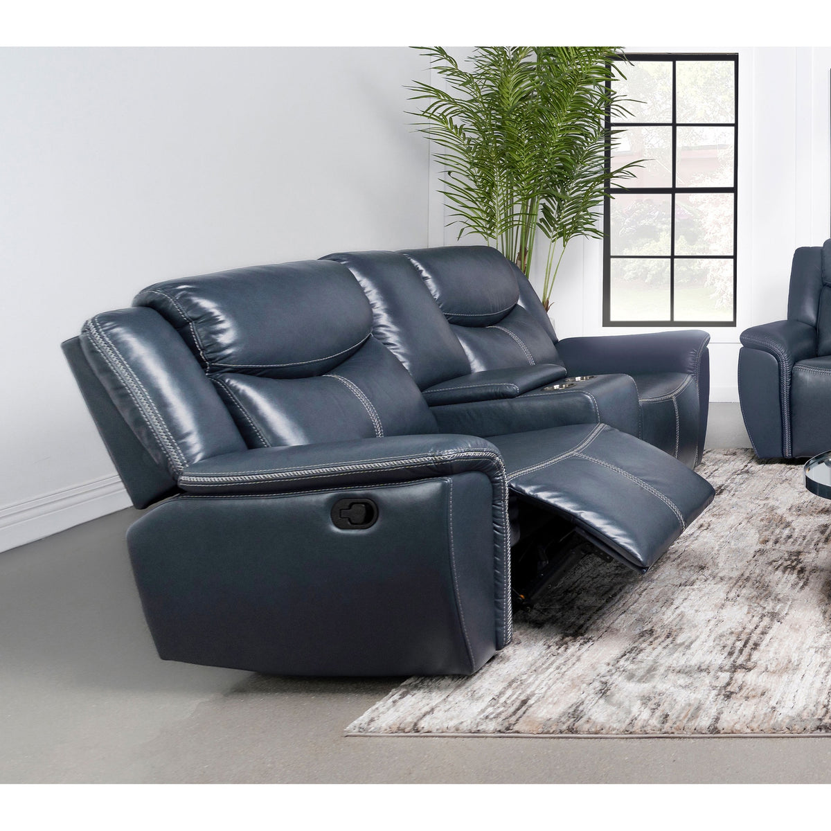 Stanwicke Blue Motion Reclining Loveseat with Console