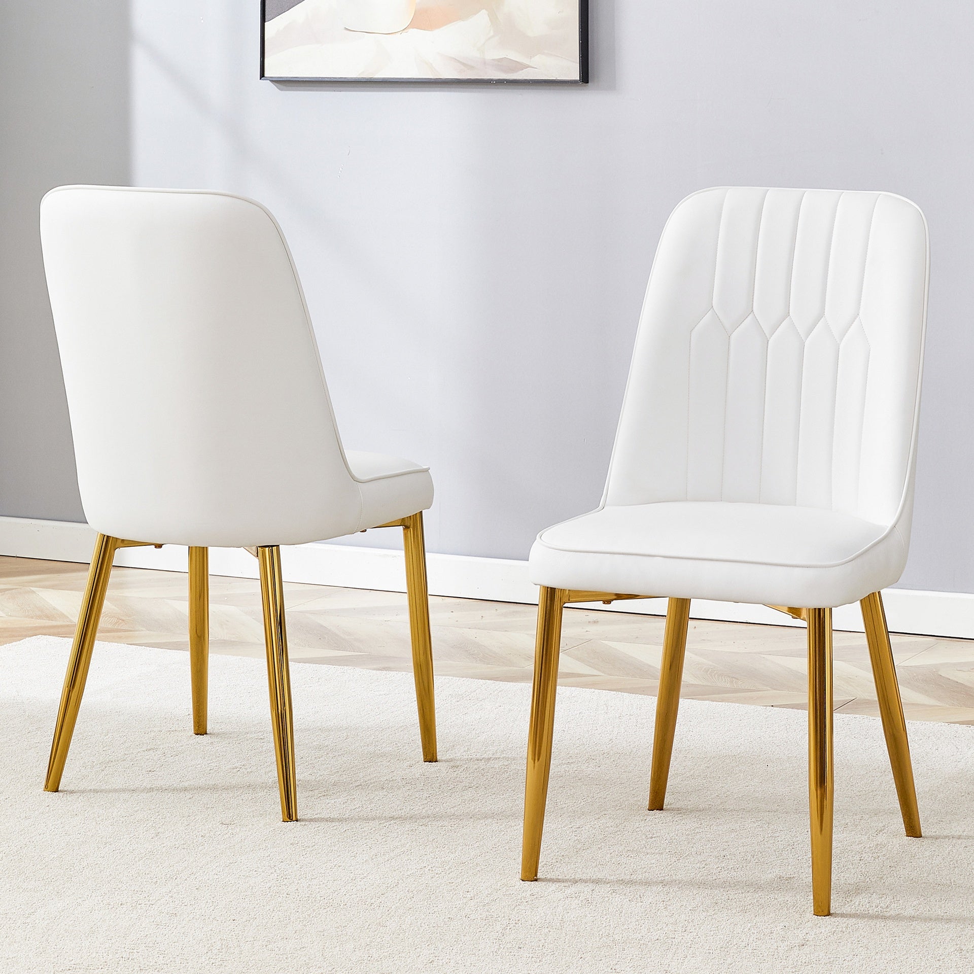 2 modern dining chairs, sleek PU leather backrest, and gold metal legs bring a comfortable home experience to the kitchen, bedroom, and office.W1151P183322
