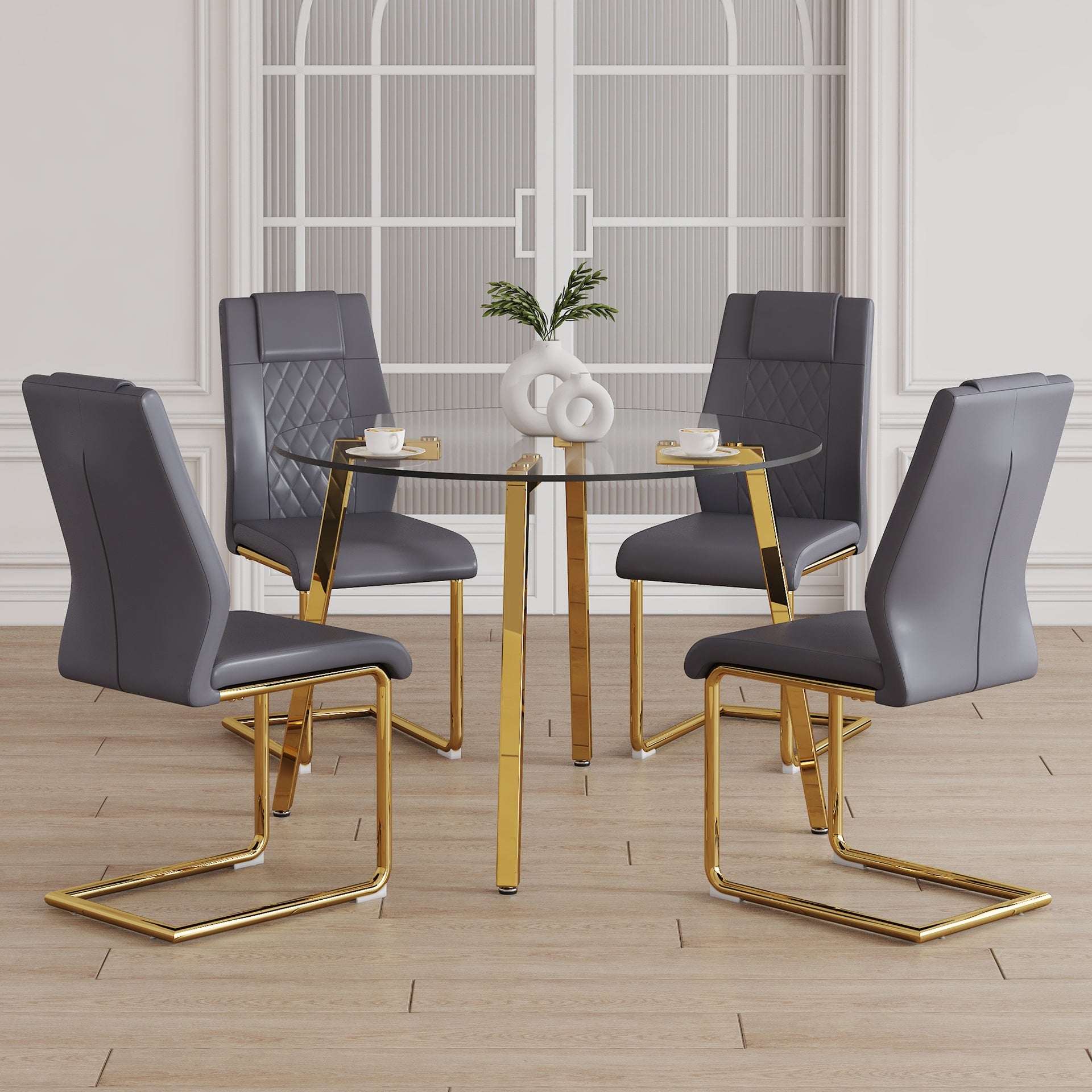 Table and chair set.A Modern Minimalist Style Round Clear Tempered Glass Table with Metal Legs.Paried with dark gray chairs with Modern PU Leather High Back Upholstered and C-Tube Golden Legs.