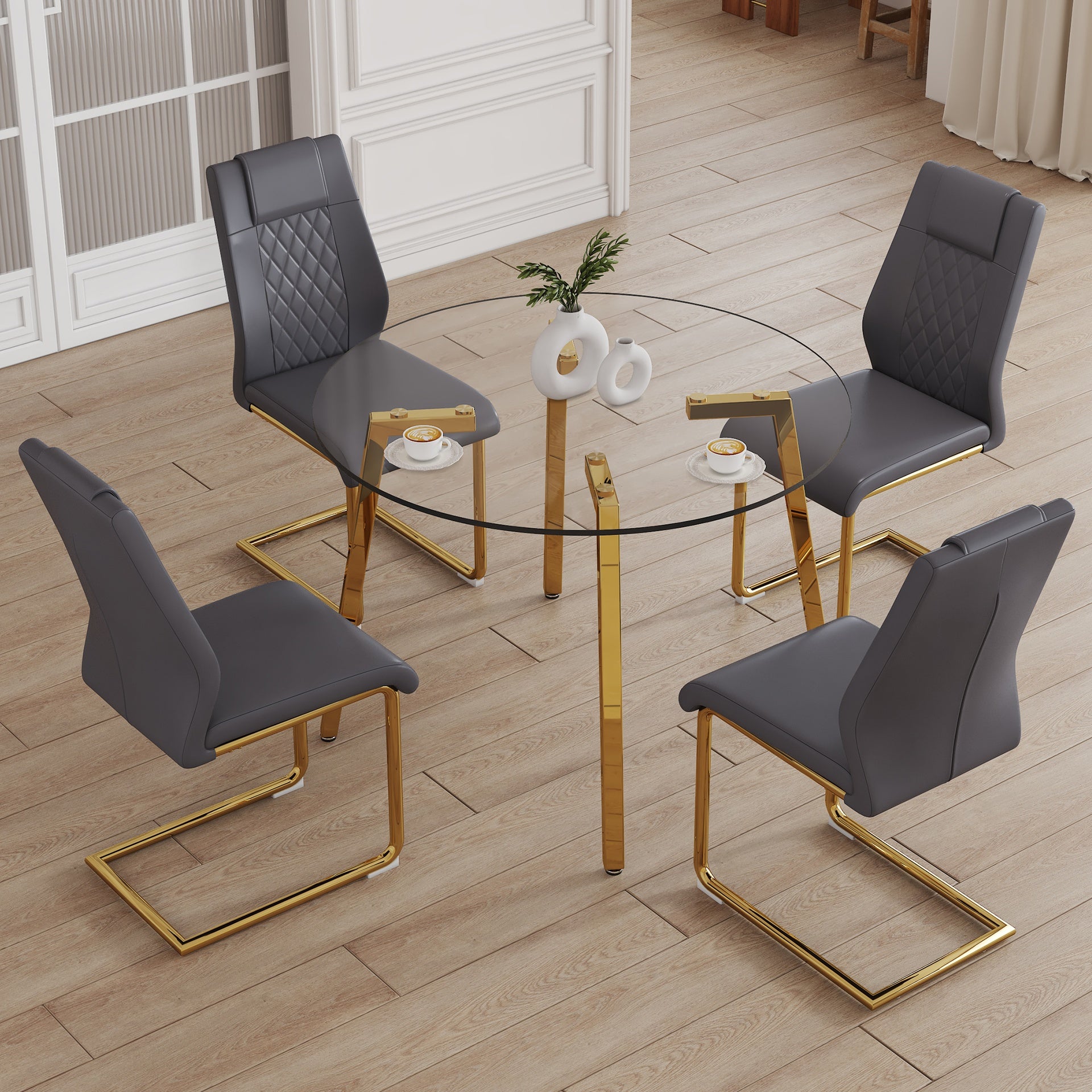 Table and chair set.A Modern Minimalist Style Round Clear Tempered Glass Table with Metal Legs.Paried with dark gray chairs with Modern PU Leather High Back Upholstered and C-Tube Golden Legs.