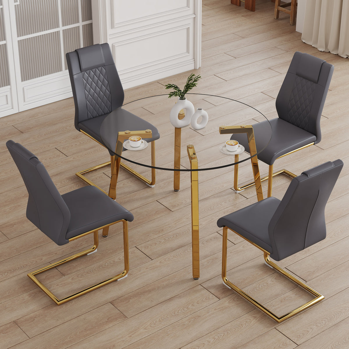 Table and chair set.A Modern Minimalist Style Round Clear Tempered Glass Table with Metal Legs.Paried with dark gray chairs with Modern PU Leather High Back Upholstered and C-Tube Golden Legs.