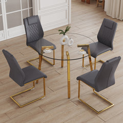 Table and chair set.A Modern Minimalist Style Round Clear Tempered Glass Table with Metal Legs.Paried with dark gray chairs with Modern PU Leather High Back Upholstered and C-Tube Golden Legs.