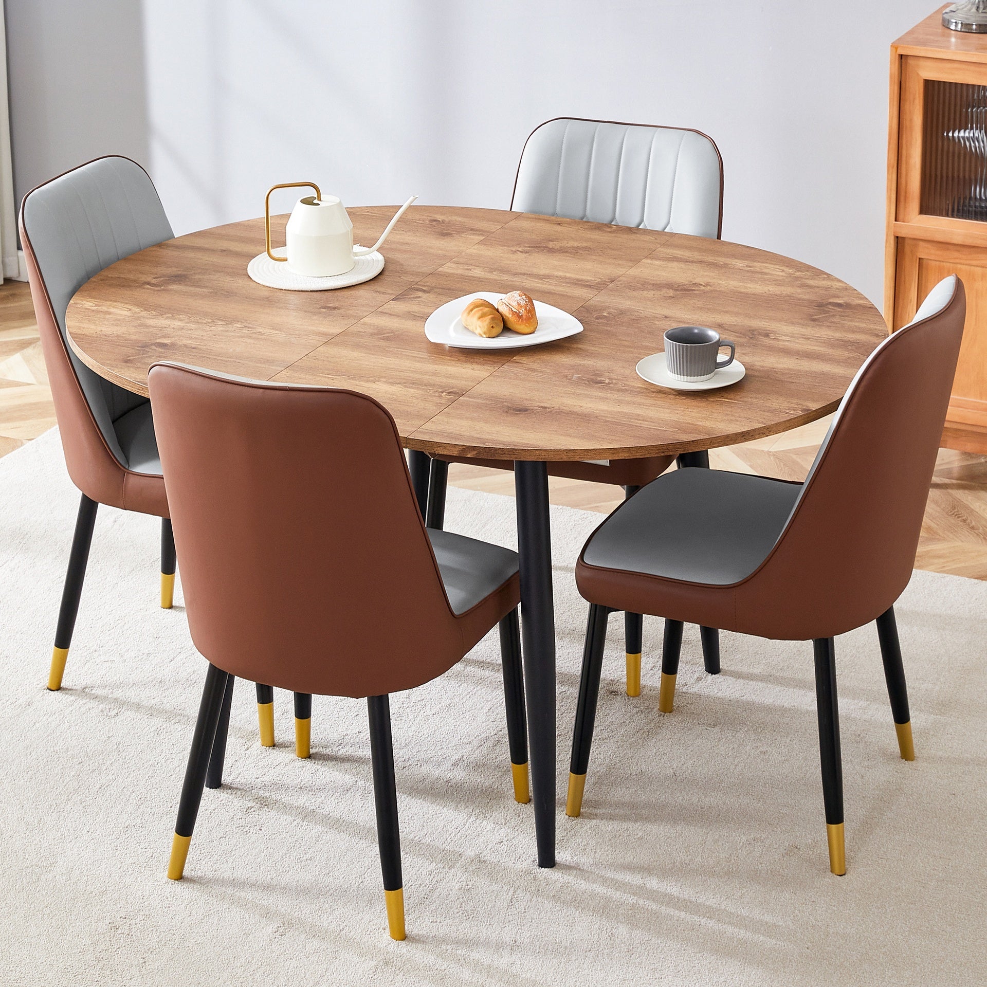 Table and chair set.Modern Extendable Wood MDF Dining Table.The table has a telescopic design, suitable for gatherings of different size.Paired with 4 chairs with PU cushions and black metal legs.