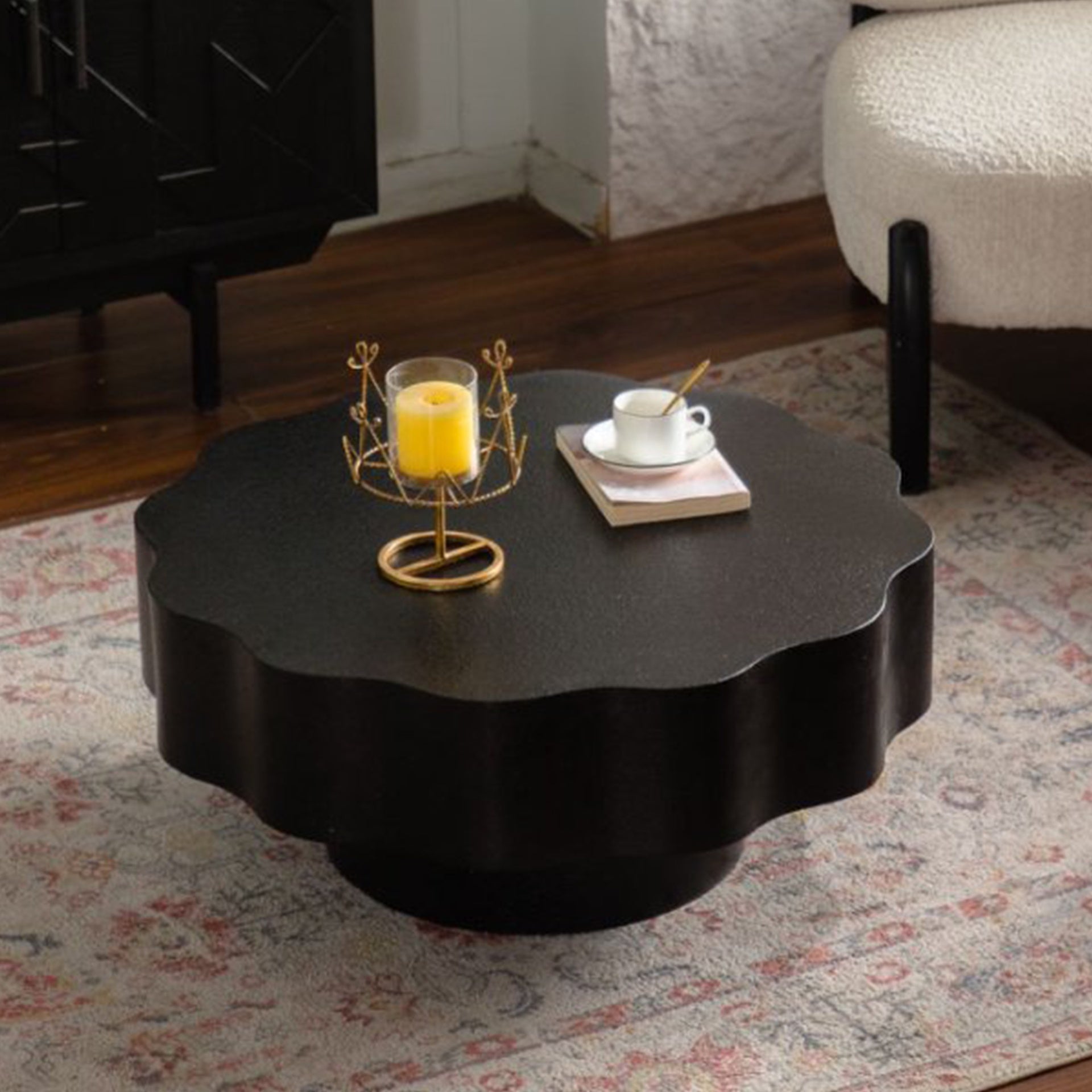 Scalloped Black Coffee Table: Unique Wave-Edge Shape, Elegant Focal Piece for Stylish Spaces.