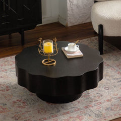 Scalloped Black Coffee Table: Unique Wave-Edge Shape, Elegant Focal Piece for Stylish Spaces.