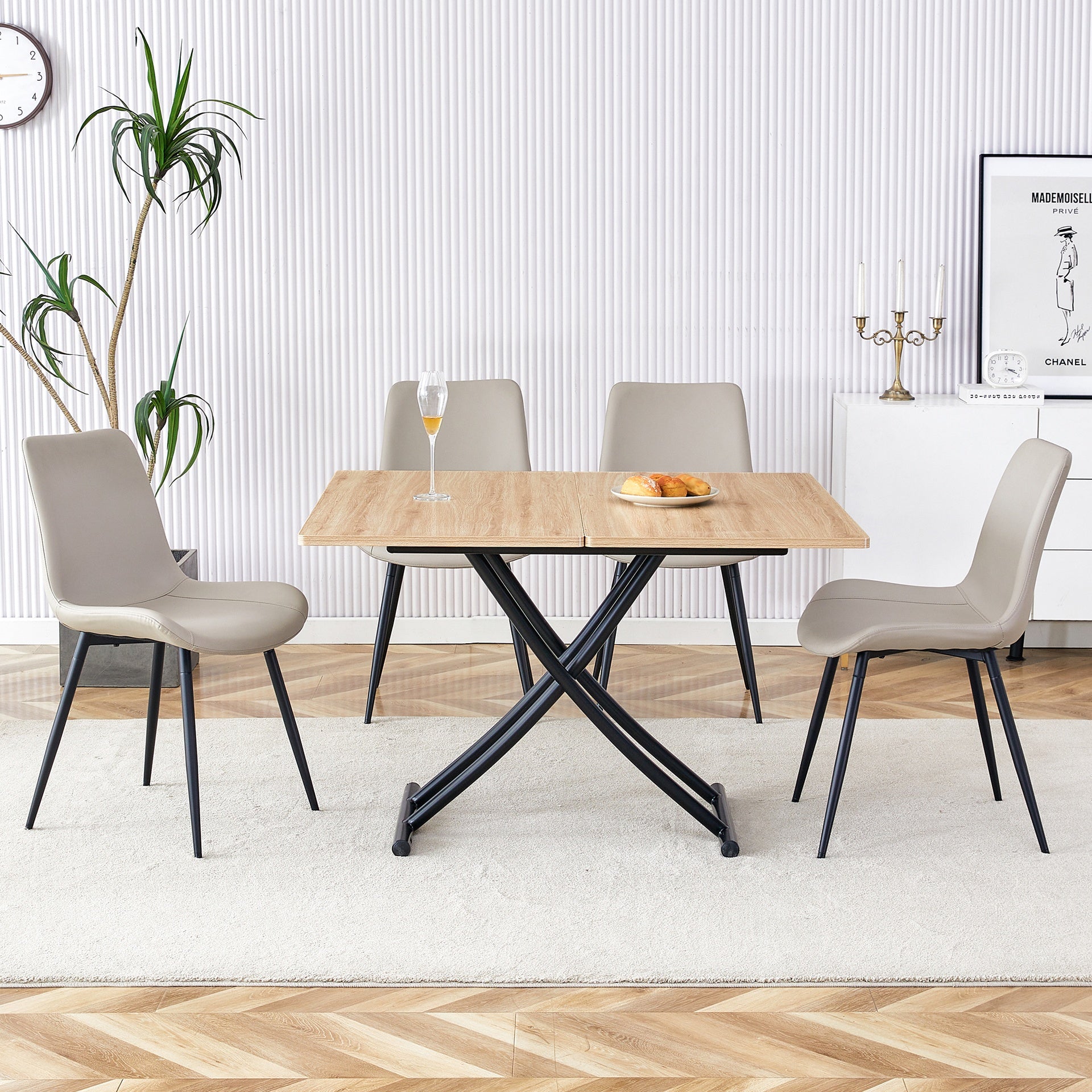 Table and chair set.Modern Multifunctional Lifting Platform,Light Wood Grain Sticker MDF Desktop,Black Metal Legs. Paired with 4 Light Gray Artificial PU Chairs With Curved Widened Cushion Design.