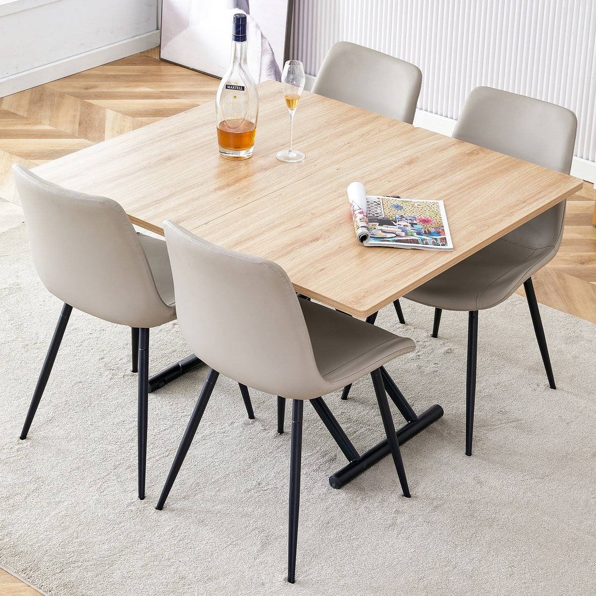 Table and chair set.Modern Multifunctional Lifting Platform,Light Wood Grain Sticker MDF Desktop,Black Metal Legs. Paired with 4 Light Gray Artificial PU Chairs With Curved Widened Cushion Design.