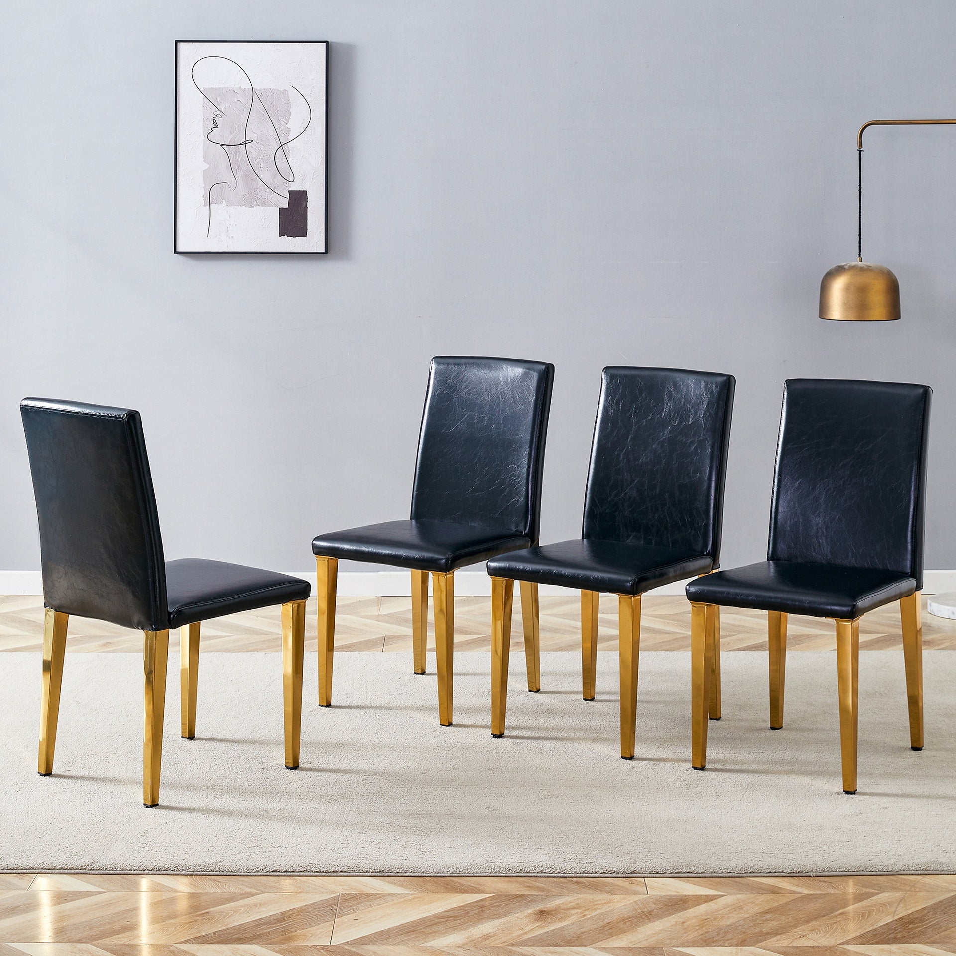 Four Black PU dining chairs, Golden Metal Legs.Simple and versatile, comfortable and accompanied. Exquisite and versatile dining chairs unlock a comfortable new experience.(Set of 4)