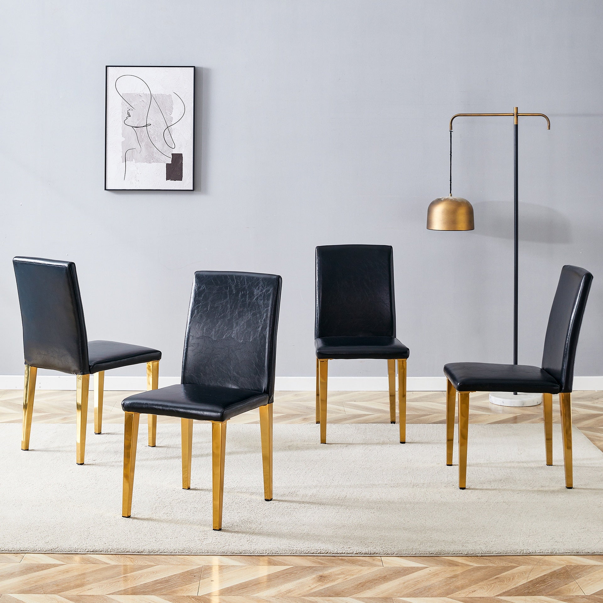 Four Black PU dining chairs, Golden Metal Legs.Simple and versatile, comfortable and accompanied. Exquisite and versatile dining chairs unlock a comfortable new experience.(Set of 4)