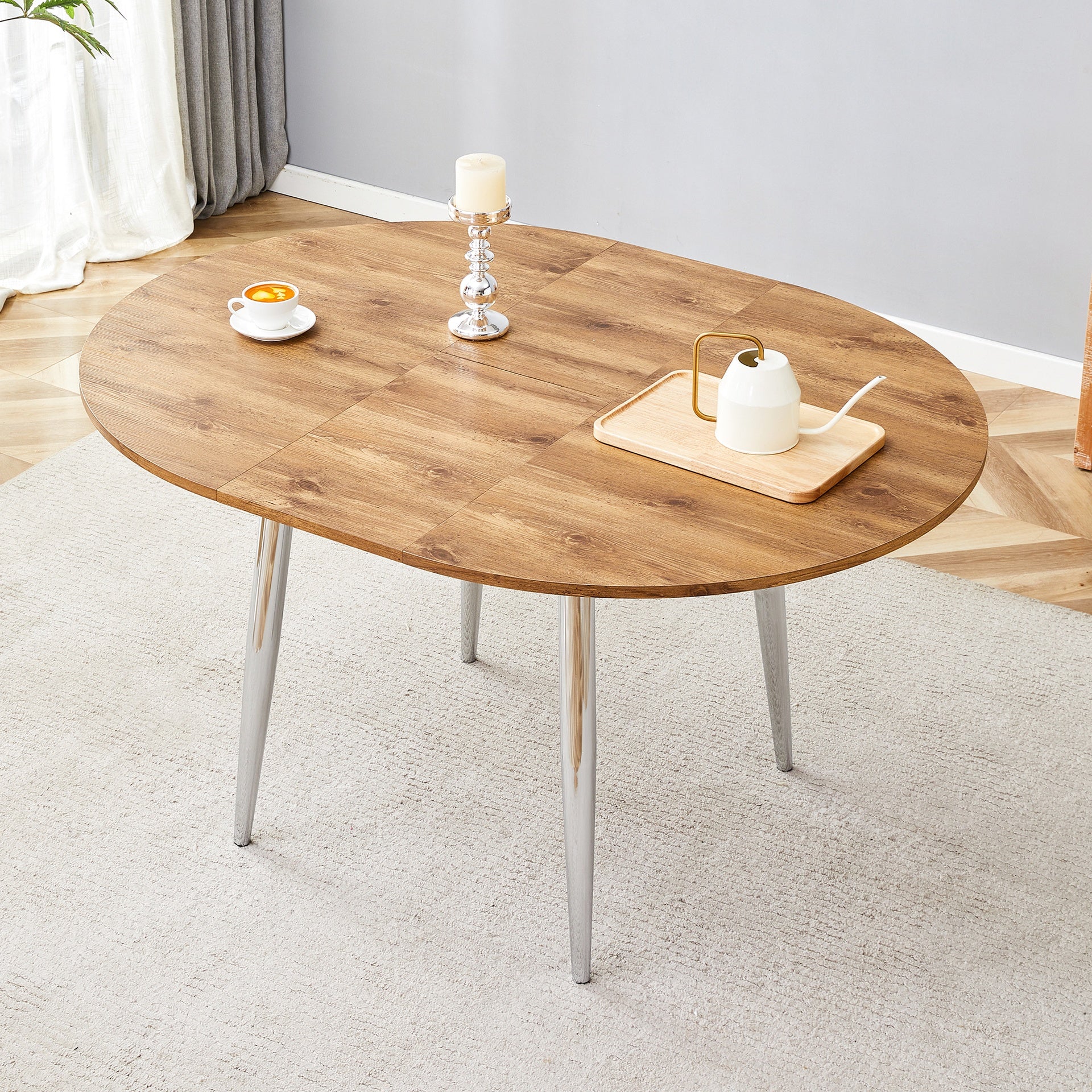 With a clever retractable mechanism, the Wood Grain MDF table top and silver metal legs and has a smooth and delicate surface.The unique look creates the sleek silhouette of a modern home.