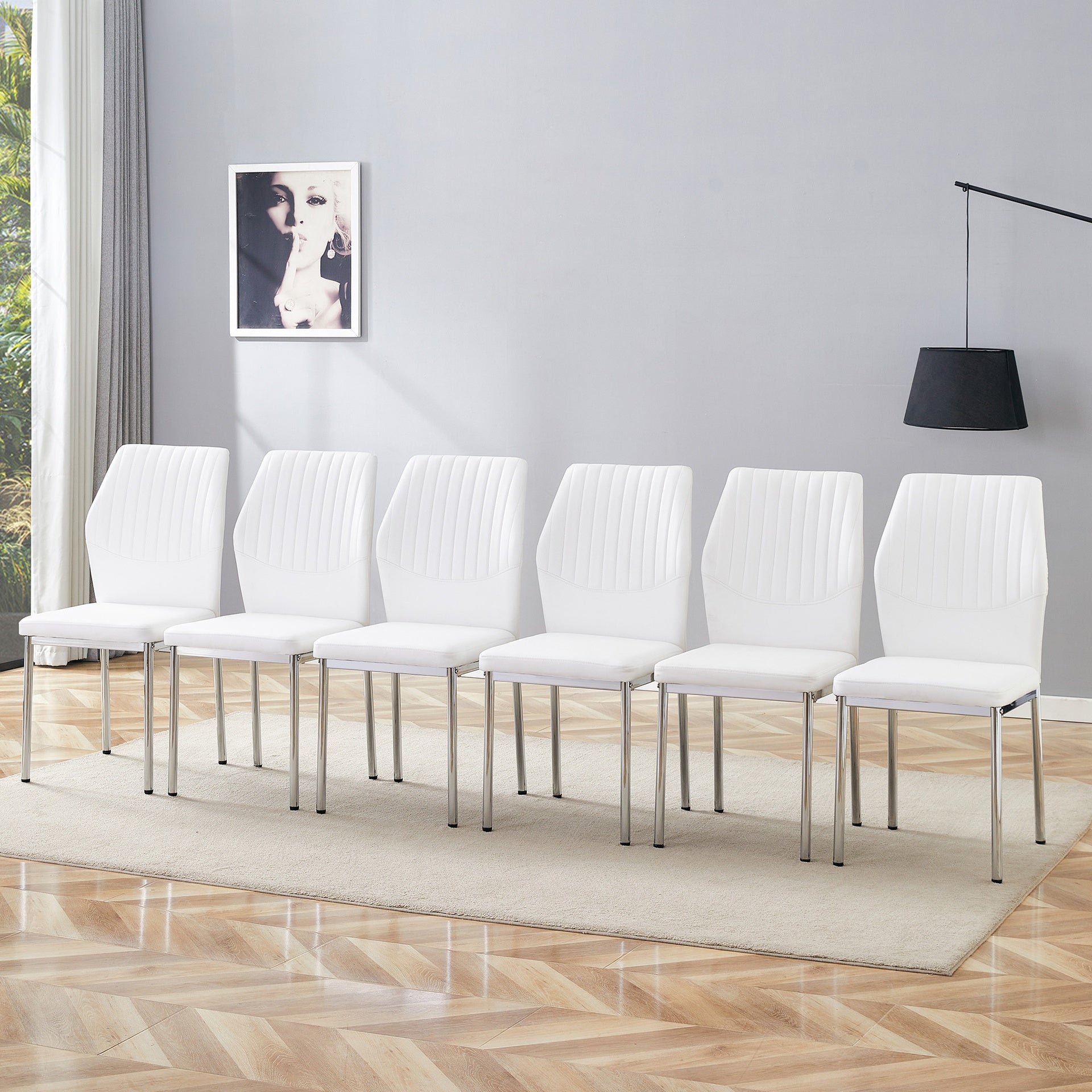 Luxury Simple Chair - Set of 6 White PU Material High Resilience Dining Chair with Metal Silver Leg.The Chair Back Has a Vertical Stripe Design With Smooth And Uniform Lines.