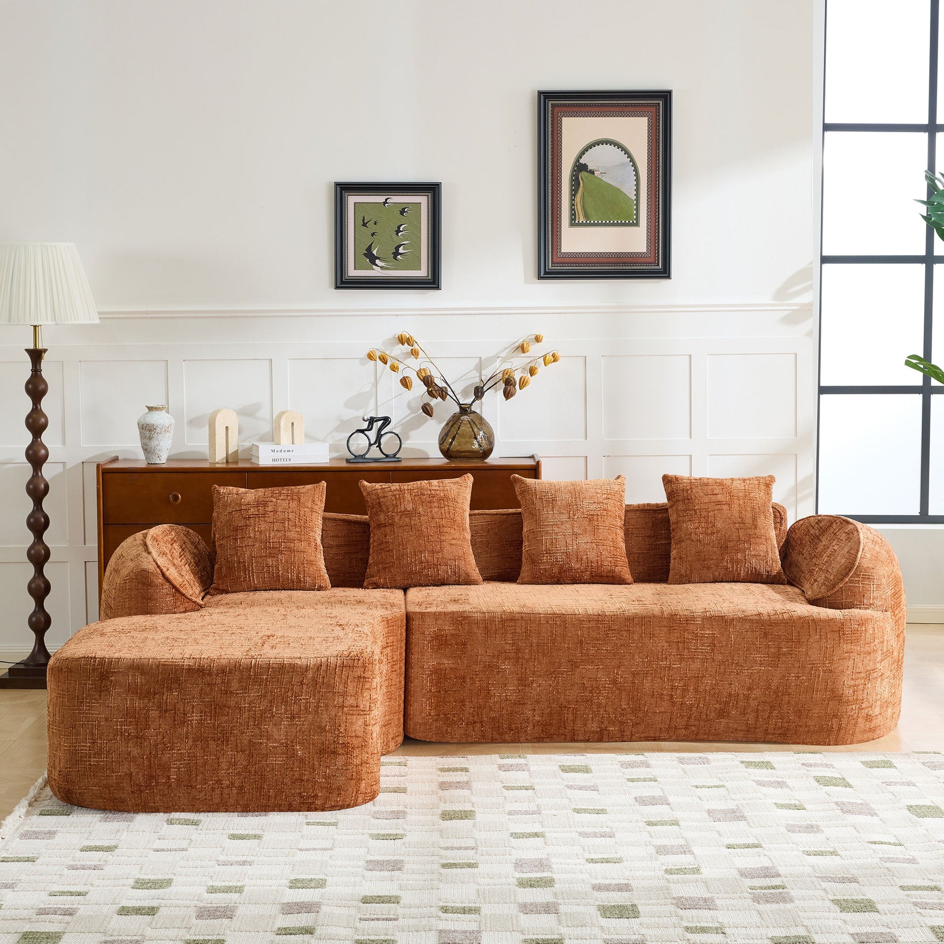 Orange chenille L-shaped compressed sofa that goes well with any living room. It features high-elastic sponge for a comfortable sitting feel,  curved armrests and four throw pillows.