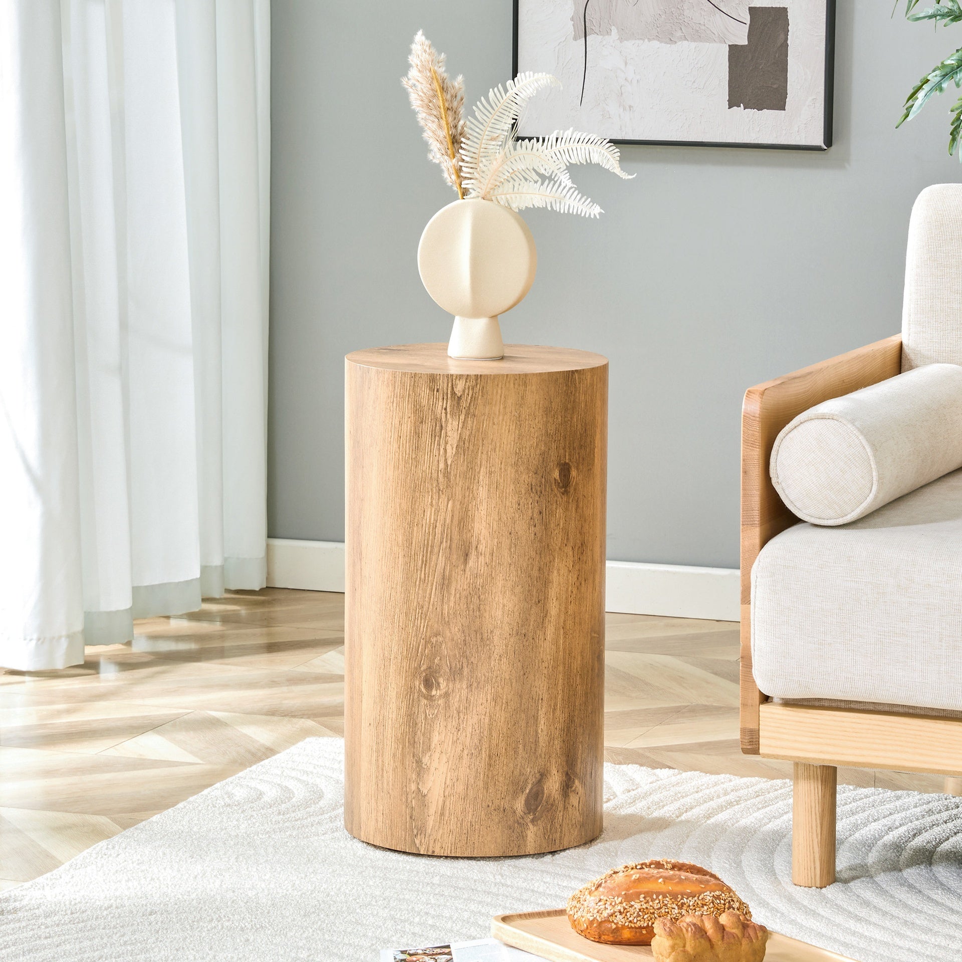 Simple wood grain cylindrical coffee table, 11.8-inch diameter x 21.6 inch height, MDF material living room furniture. Suitable for industrial style living rooms.