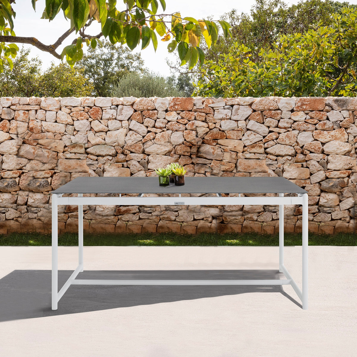 Wyncrest White Aluminum and Teak Outdoor Dining Table with Stone Top