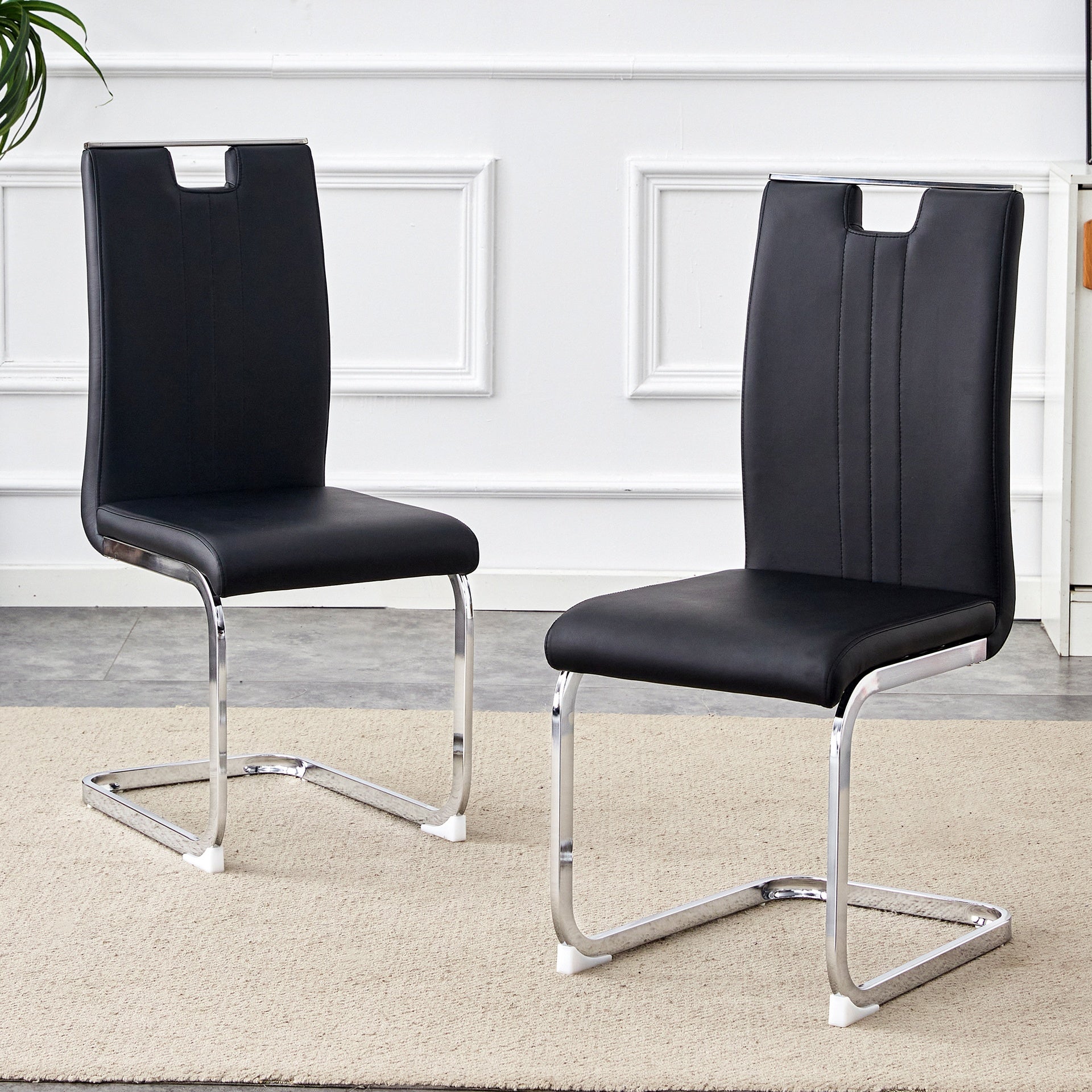 Set of 2 black PU material bow-shaped chairs - Perfectly integrated into industrial and modern home design