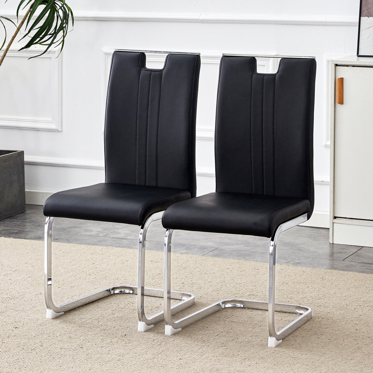 Set of 2 black PU material bow-shaped chairs - Perfectly integrated into industrial and modern home design