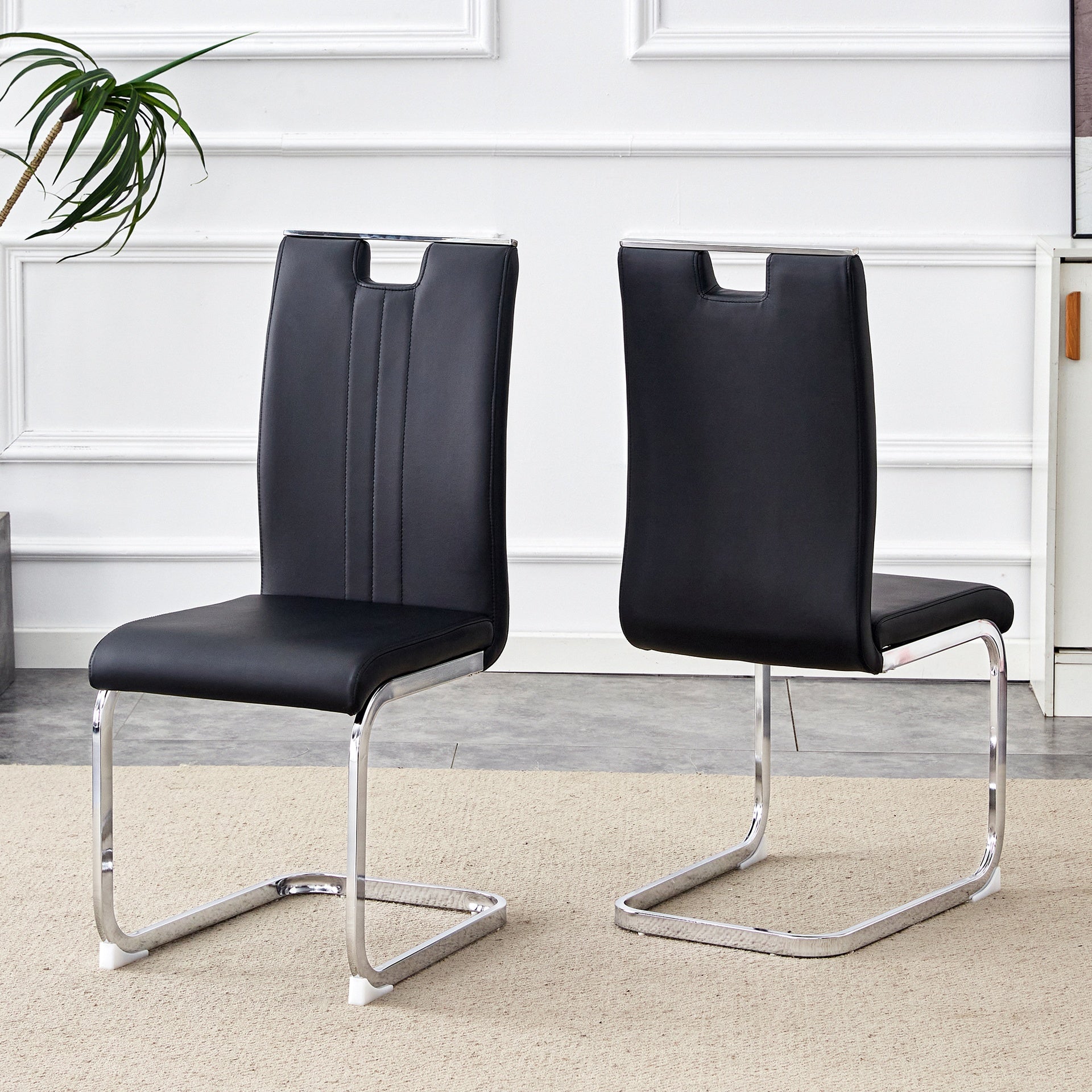 Set of 2 black PU material bow-shaped chairs - Perfectly integrated into industrial and modern home design