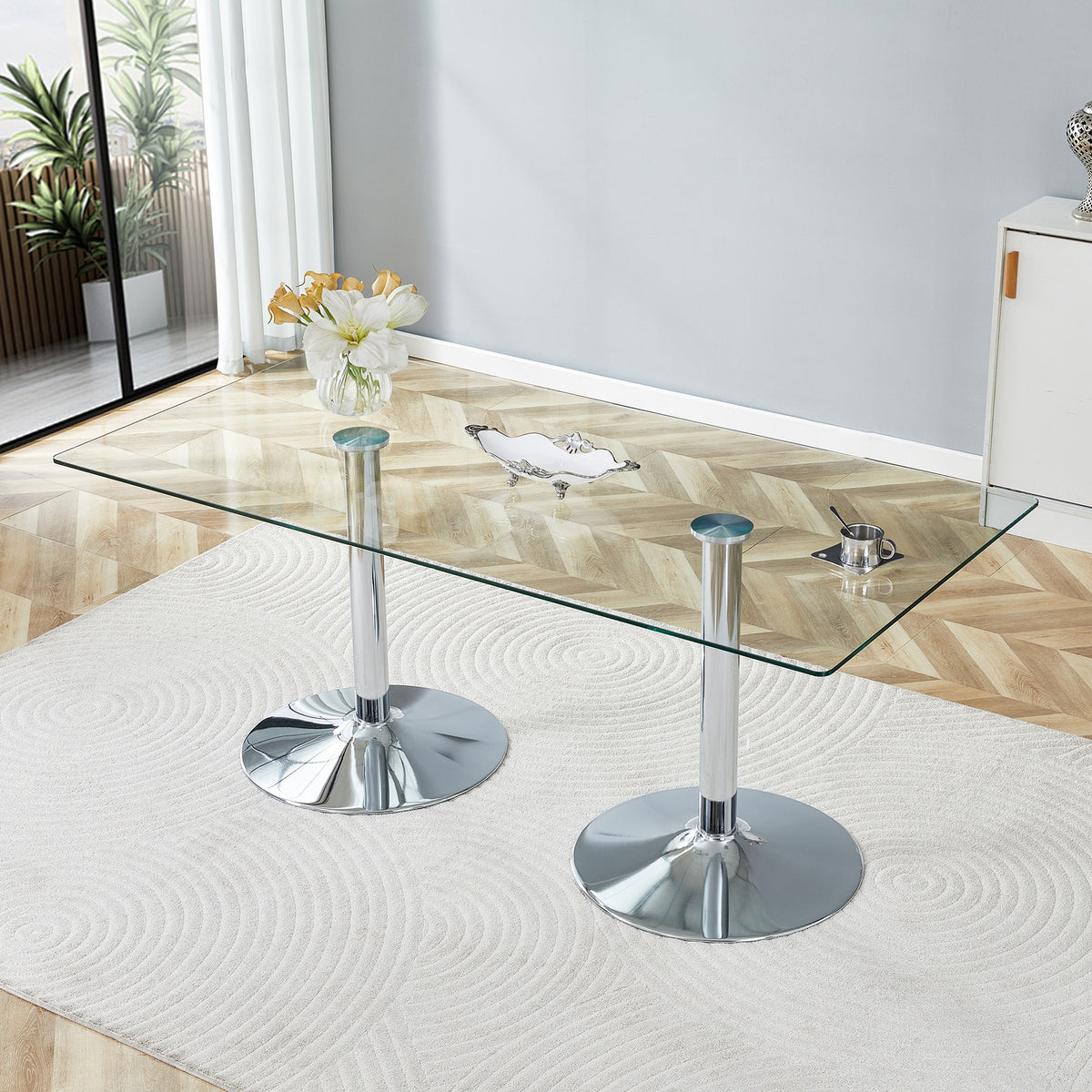 A glass tabletop with 71*35.4 inches and a modern minimalist circular dining table with electroplated silver metal legs. Suitable for restaurants, living rooms.