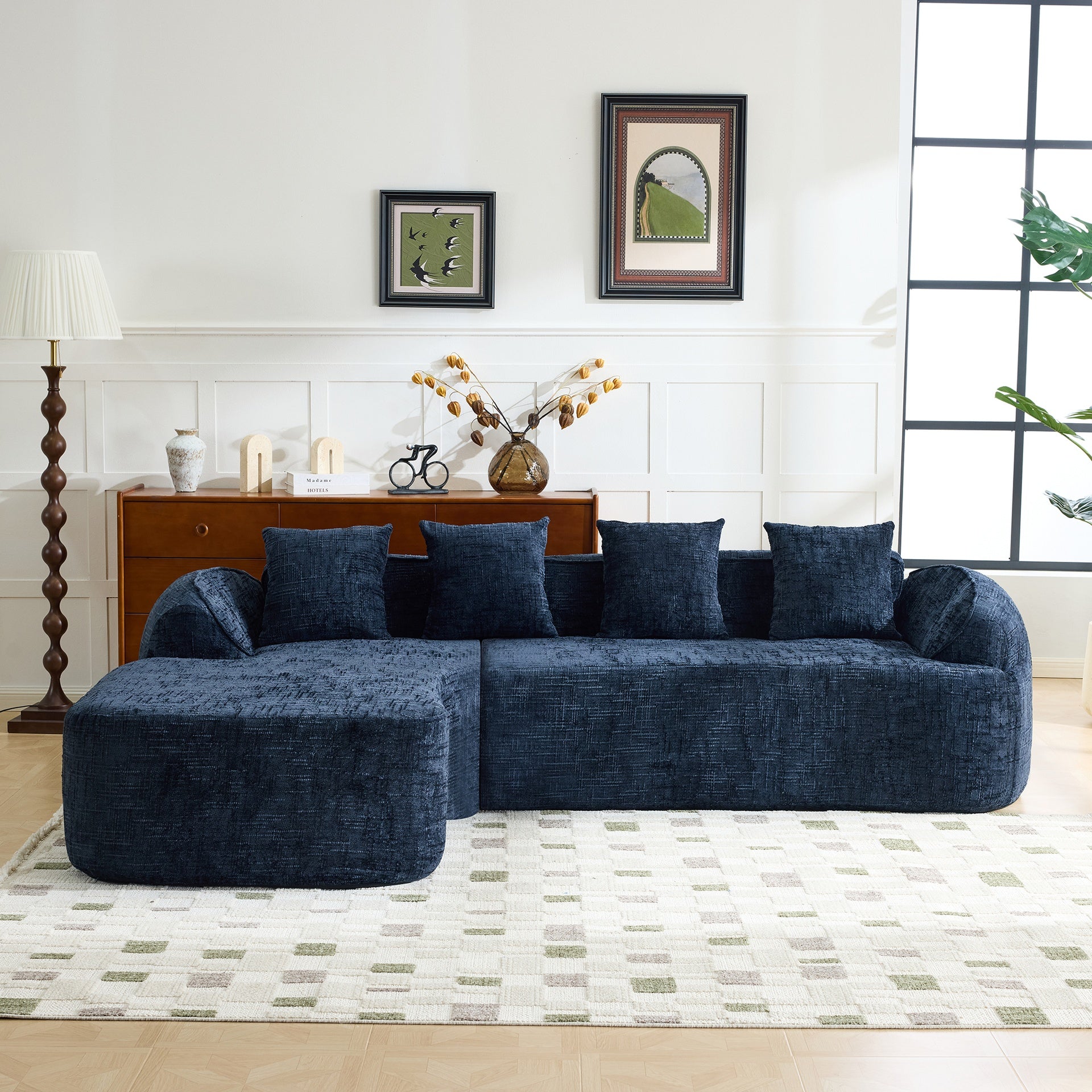 Dark bule chenille L-shaped compressed sofa that goes well with any living room. It features high-elastic sponge for a comfortable sitting feel,  curved armrests and four throw pillows.