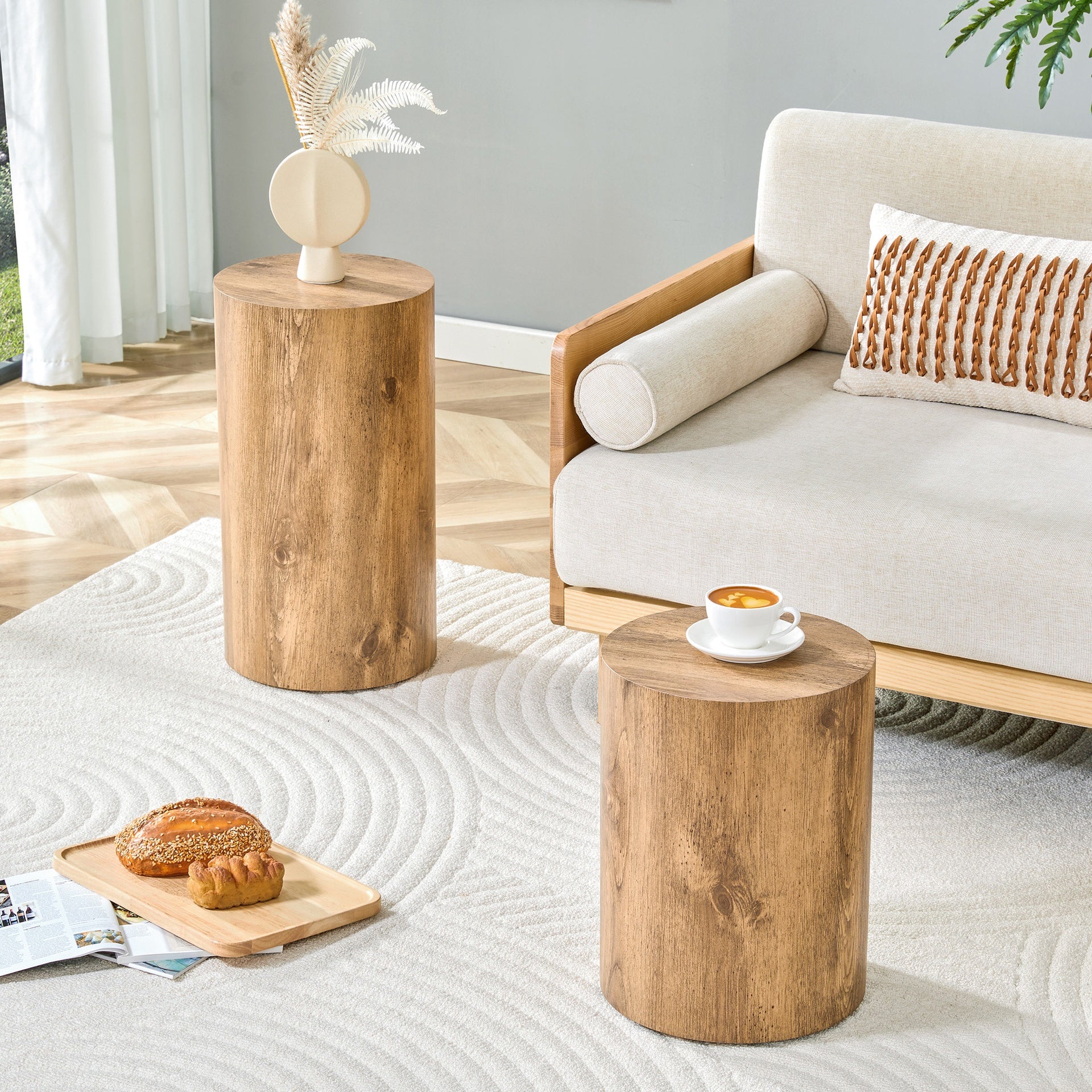 Modern Minimalist Set of Two Wood color Cylinder Marble-Patterned MDF Coffee Tables.The cylindrical table with its patterned design can be easily integrated into a variety of interior styles.