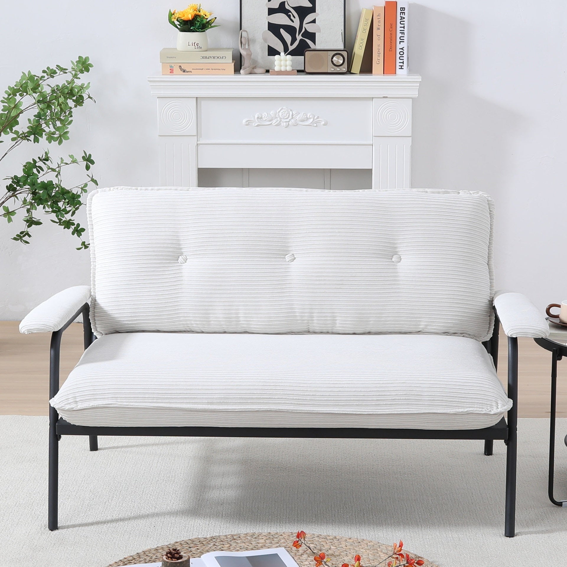 The 53-inch beige sofa offers a spacious layout in the small apartment, easily handling various scenarios from watching movies to working