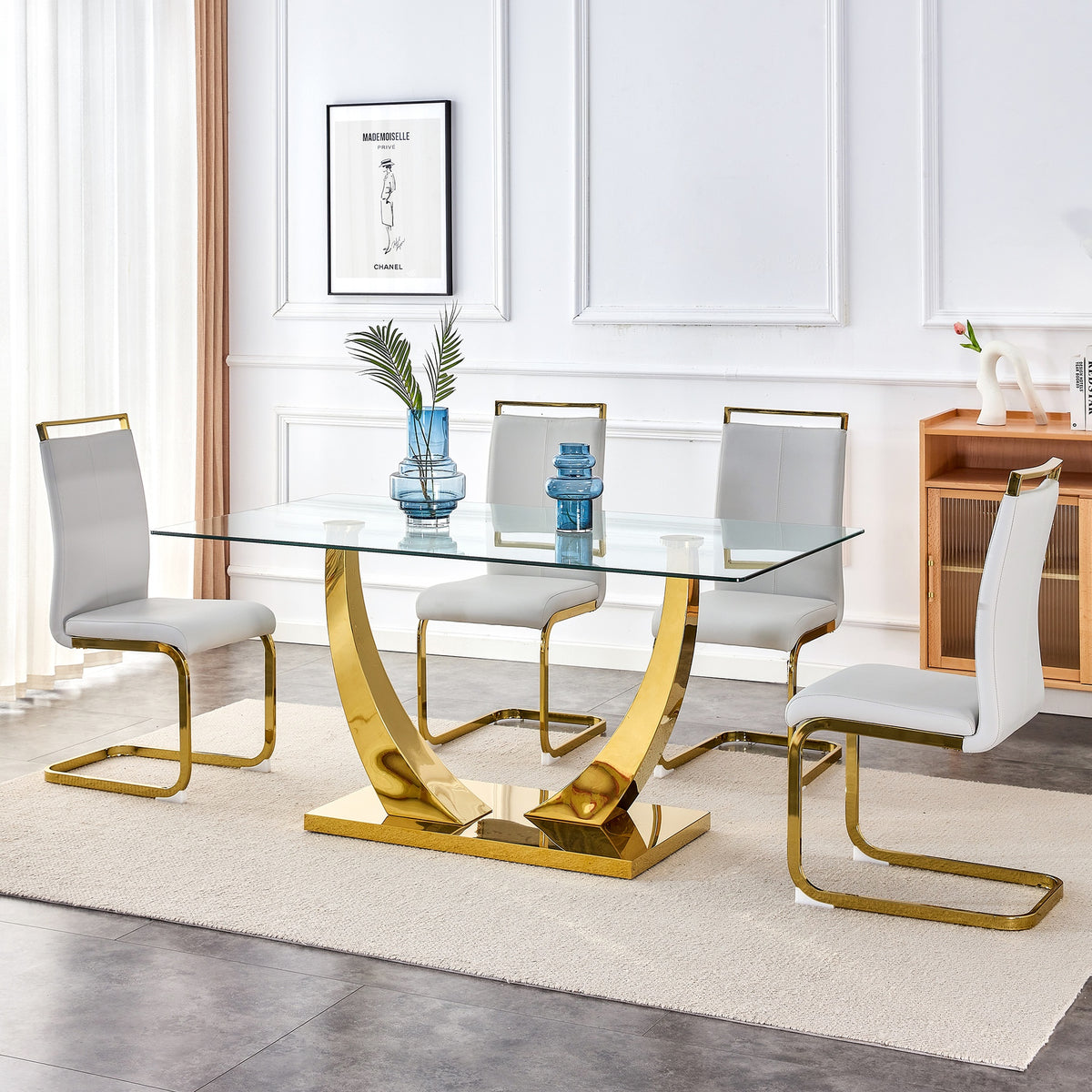 1 table with 4 light gray chairs. Glass dining table. Equipped with 0.39 "tempered glass tabletop and gold-plated metal irregular bracket. Used in kitchens, dining rooms, living rooms.W1151S00655