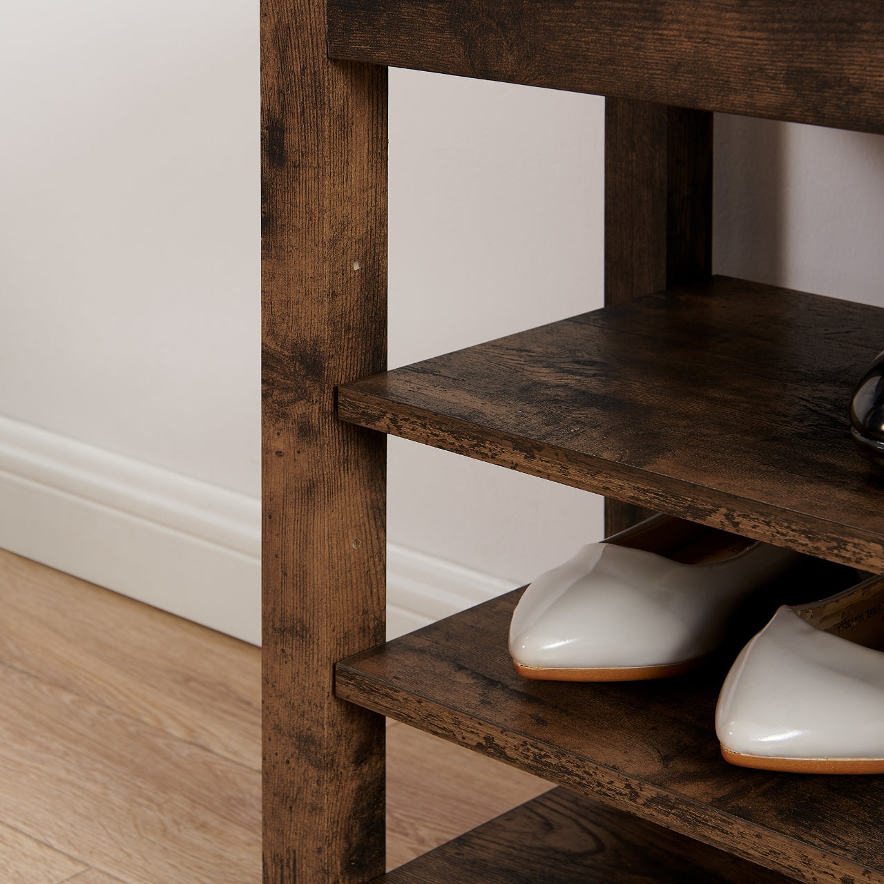A height-adjustable shoe-changing bench made of high-quality wood, equipped with a comfortable seat and concealed storage space, featuring charcoal-grained wood ,Vintage