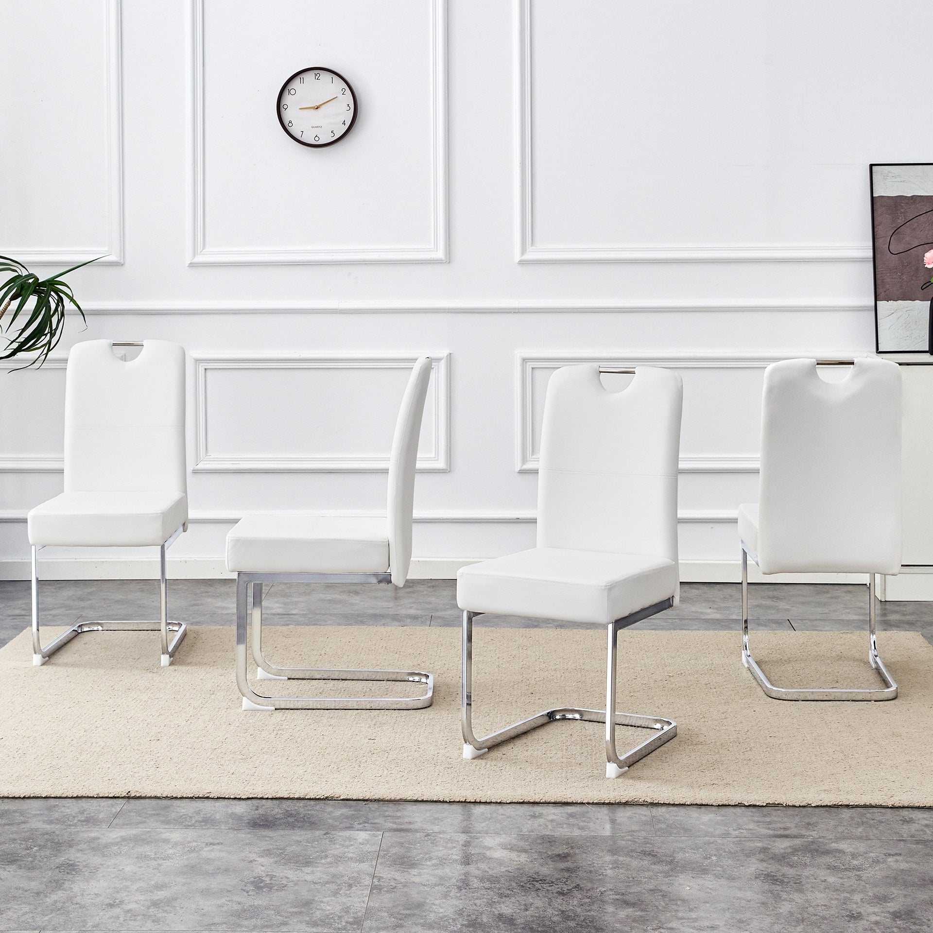 Set of 4 white thickened dining chairs with built- in spring packages and ergonomic design,perfectly blending comfort and elegance,with product dimensions of 15.7*20*38.2 inches.