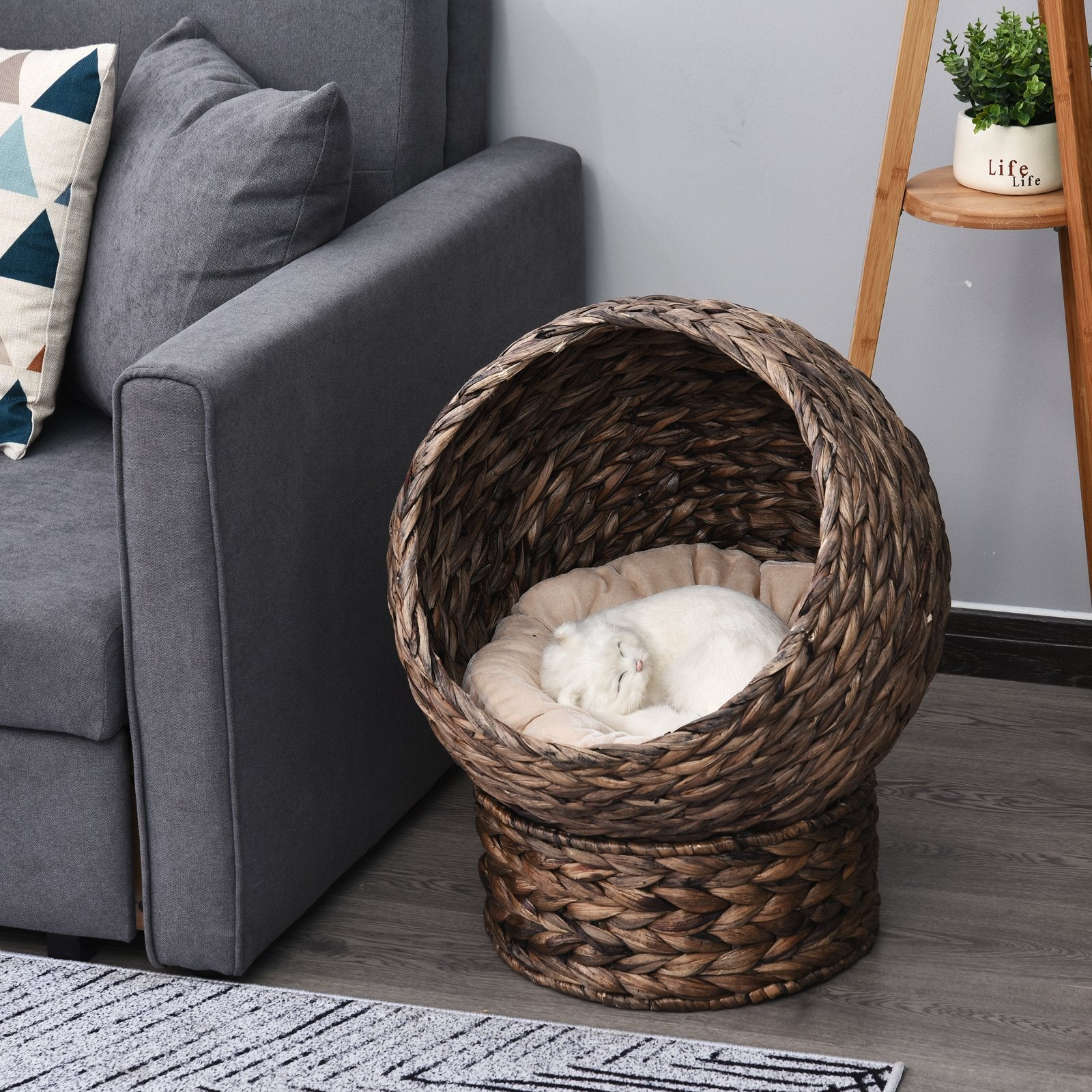 PawHut Handwoven Elevated Cat Bed with Rotating Basket and Soft Cushion, Wicker Cat Egg Chair with Stand, Brown