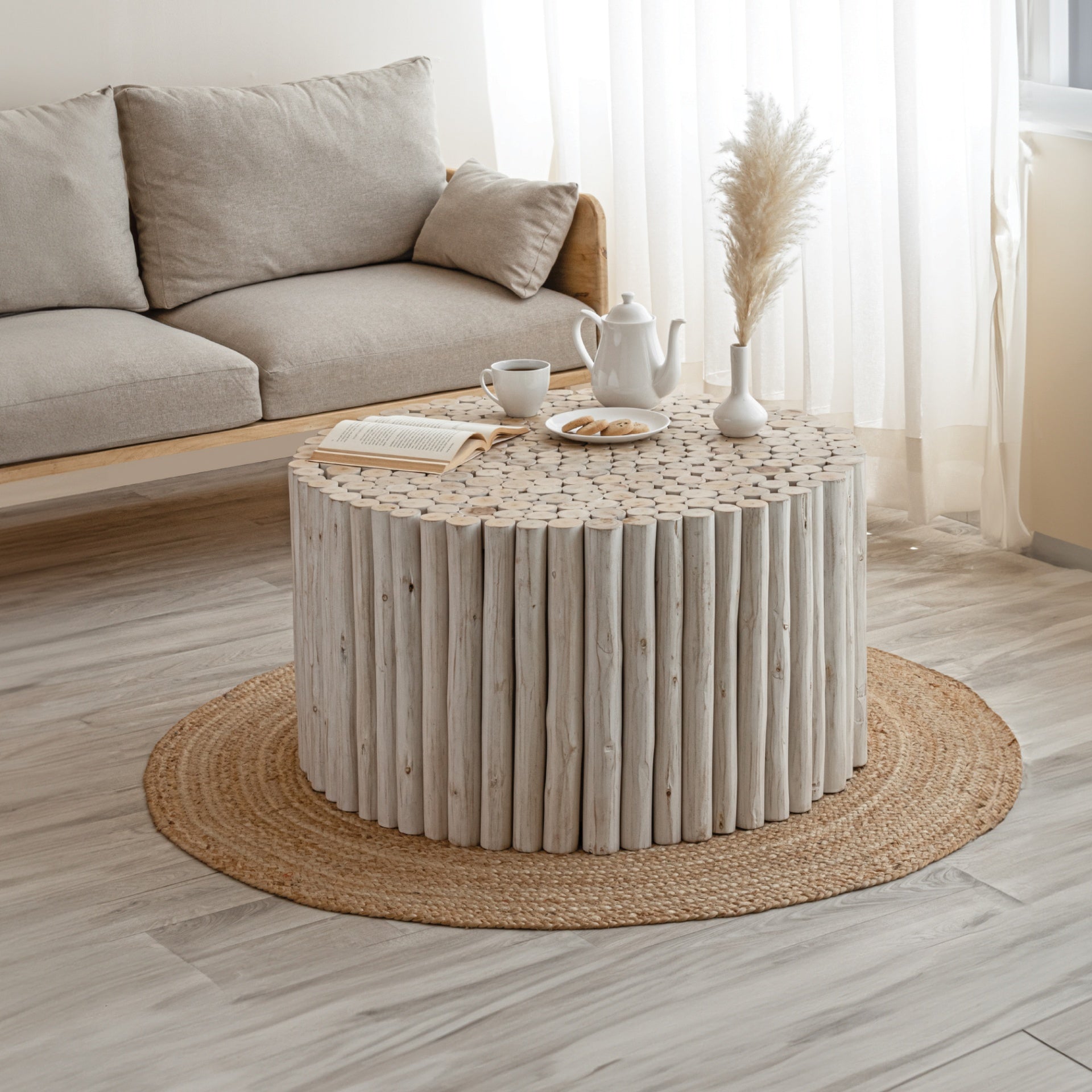 T1009 handcrafted round coffee table made from natural wooden logs featuring a detailed carved top, earthy charm in White
