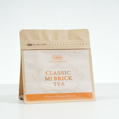 Kraft paper packaging of Classic Mi Brick Tea on a white background