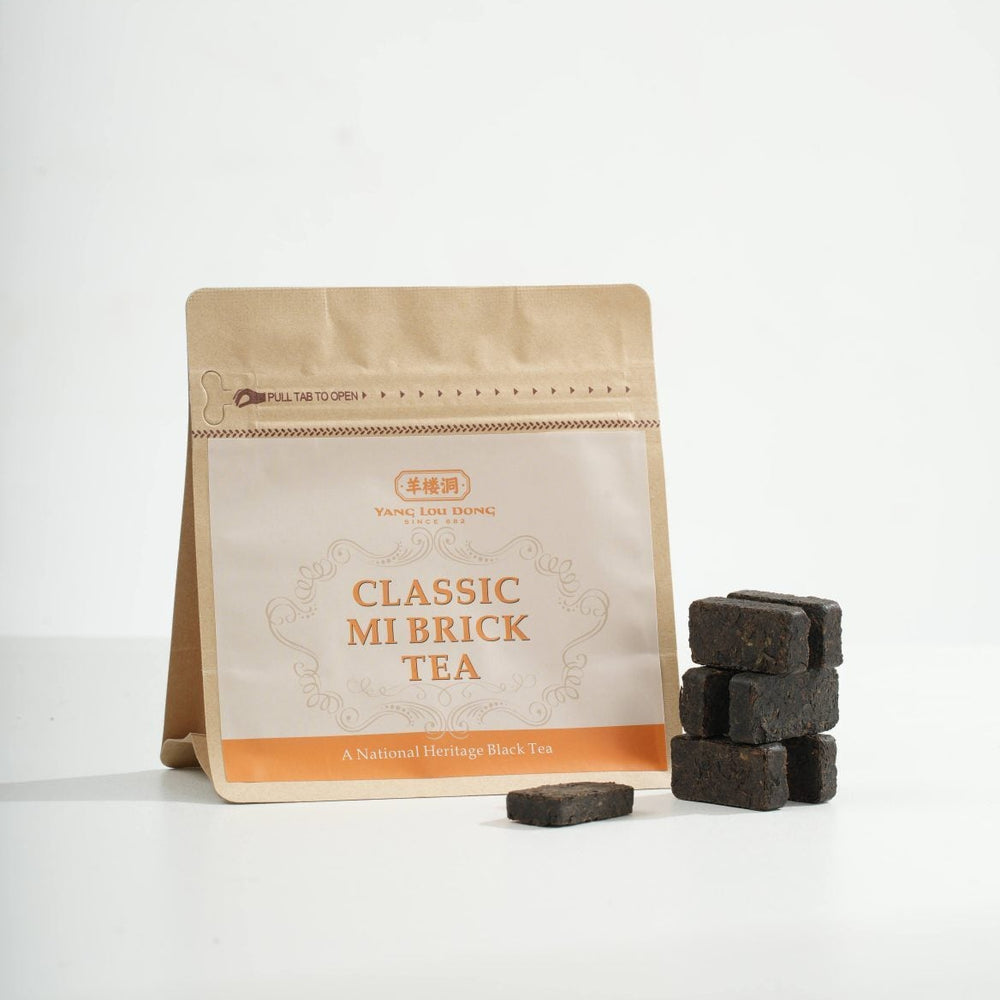 Bag of Classic Mi Brick Tea with tea bricks on a white background