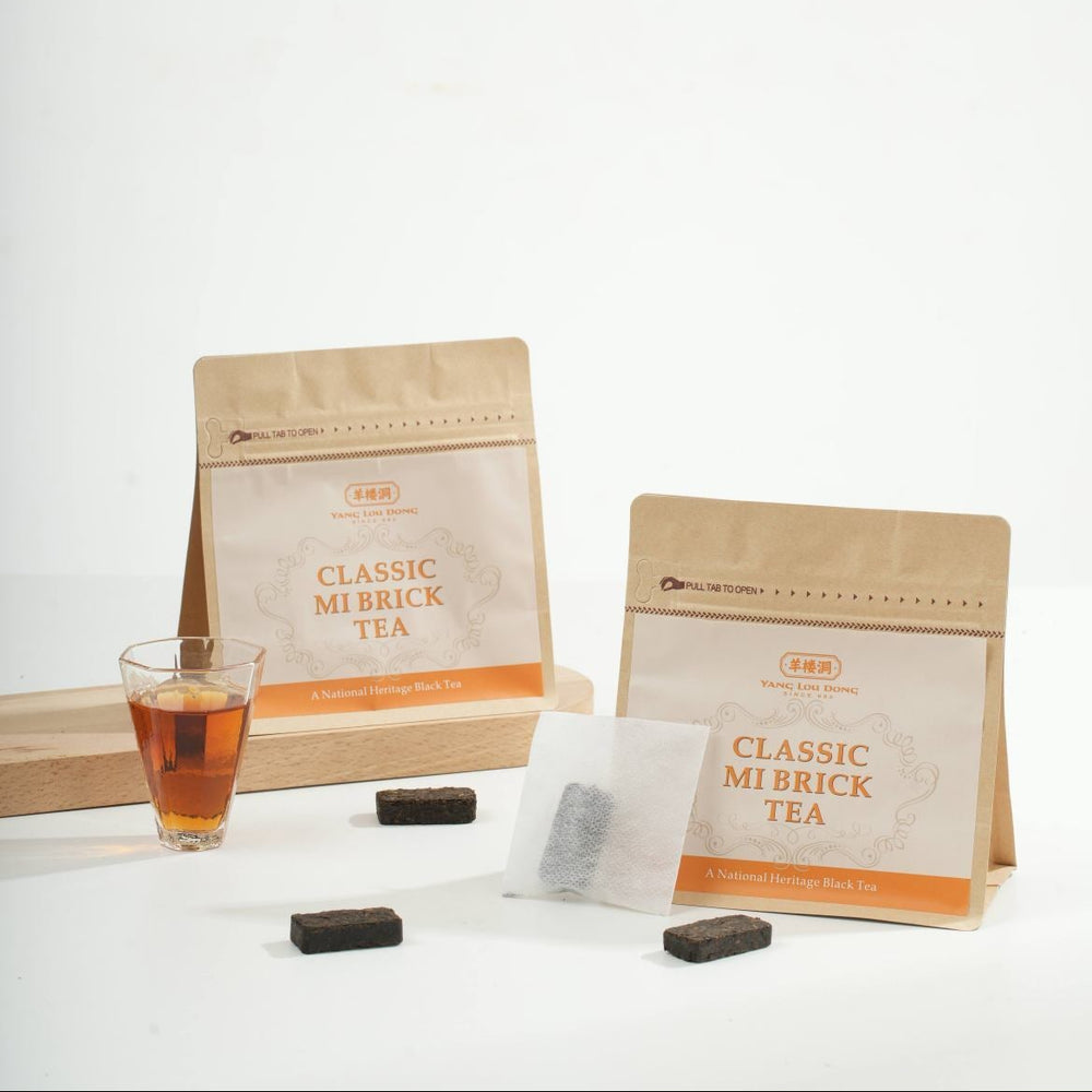 Tea packaging with a glass of tea on a white background