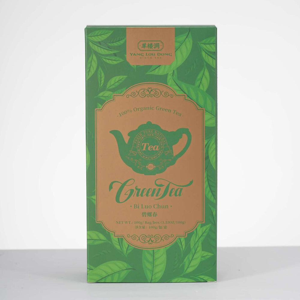 Green tea box with leaf design on a white background