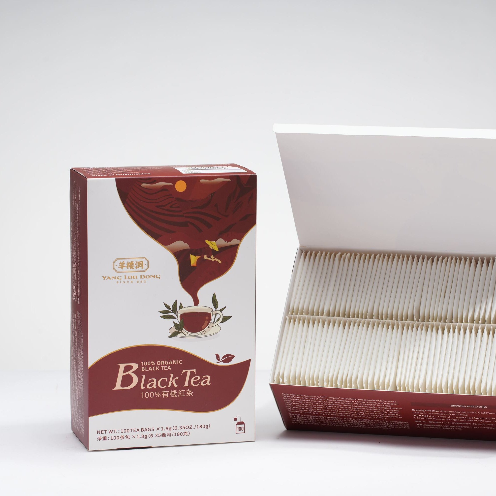 Tea box with black tea packaging on a white background